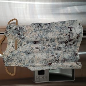 Peach and blue green print. V neck sleeveless top